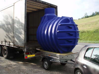 Transport et livraison d'un récupérateur d'eau de pluie